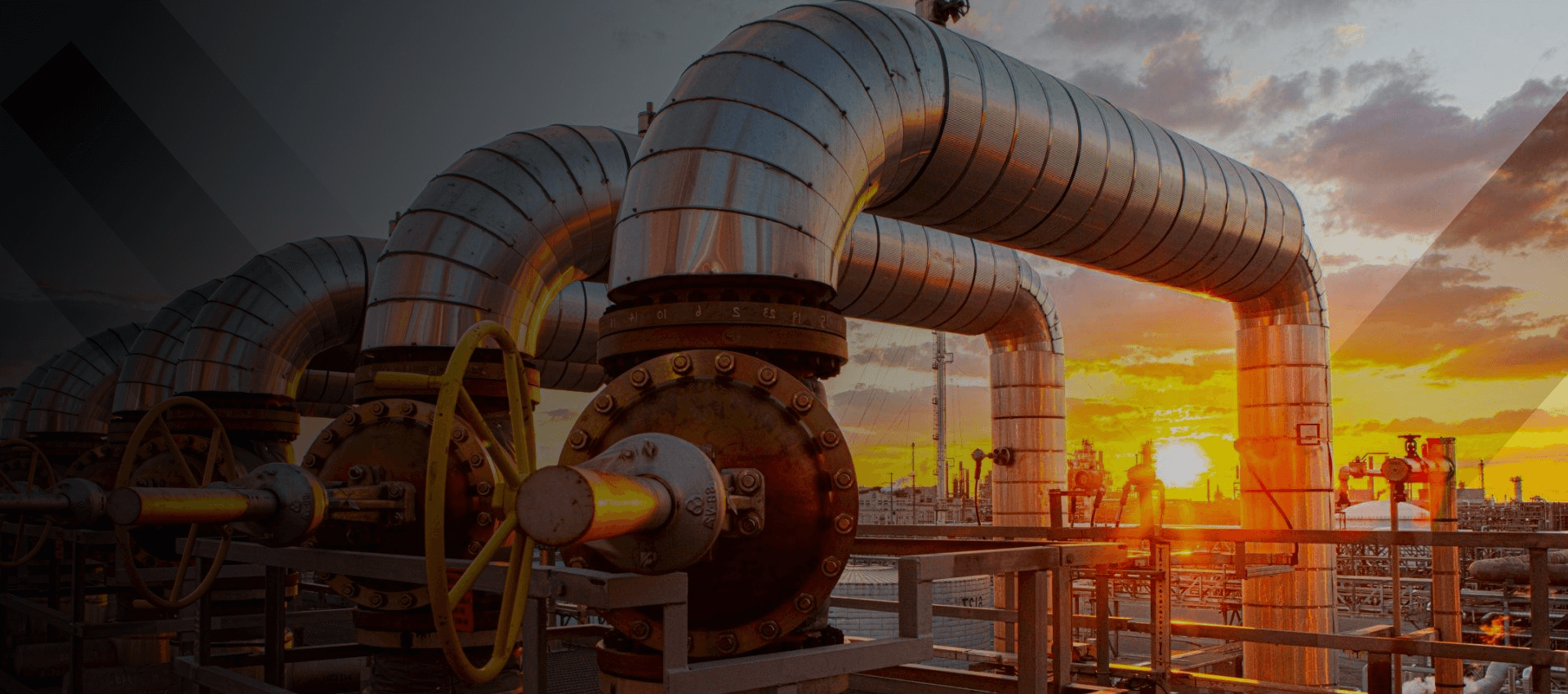 Petroleum processing infrastructure and pipelines at sunset